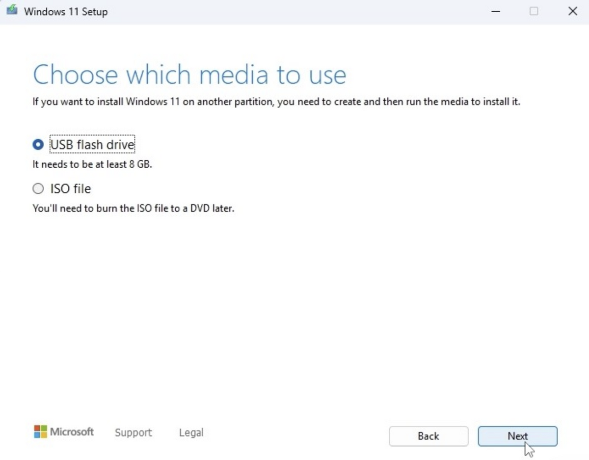 Windows 11 Setup — Choose which media to use, with USB flash drive selected